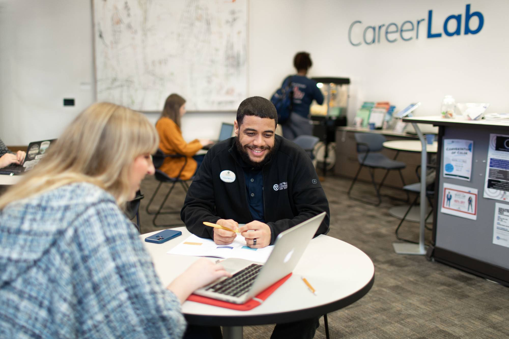 Student and Staff working in Career Lab
